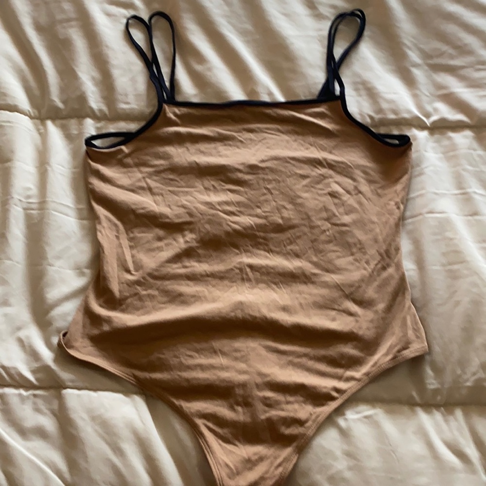 Cute strappy bodysuit, brand new!